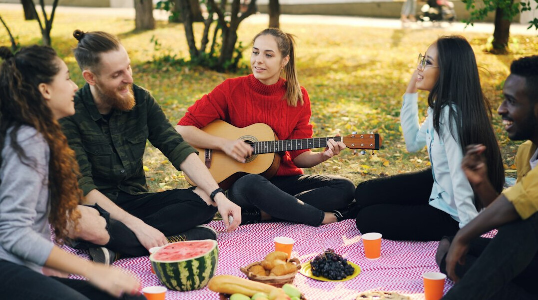 group of friends talking outdoors