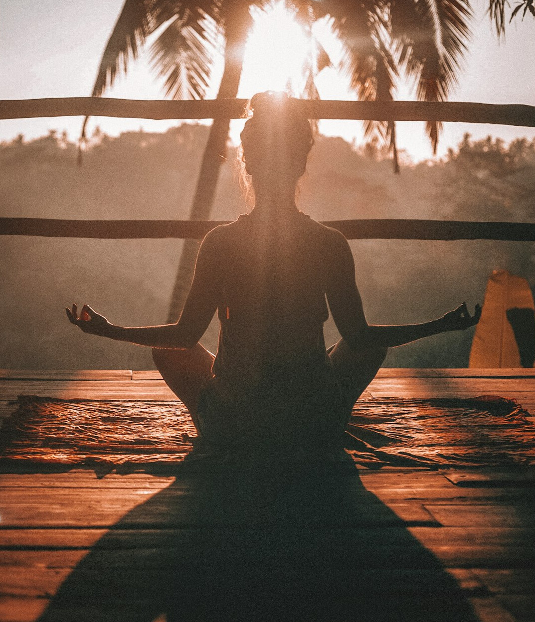 woman doing yoga at home